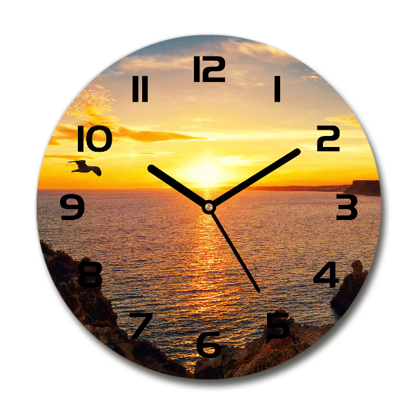 Wanduhr rund Sonnenuntergang am Meer