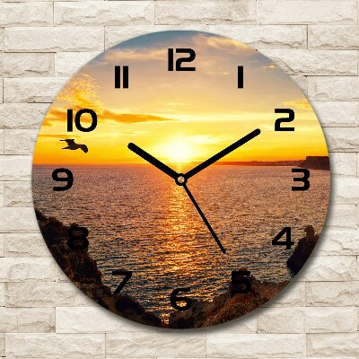Wanduhr rund Sonnenuntergang am Meer