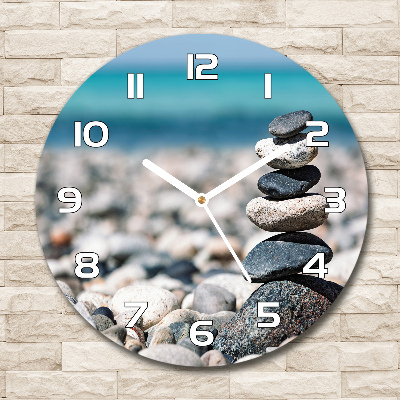 Wanduhr rund Ein Steinhaufen
