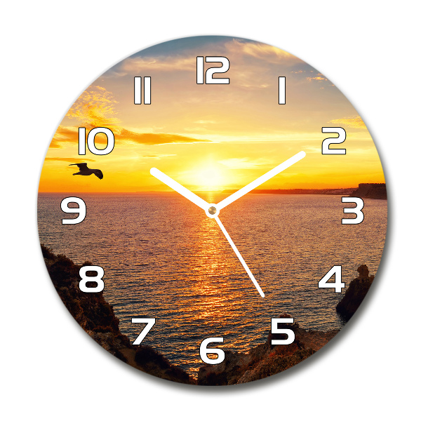 Wanduhr rund Sonnenuntergang am Meer
