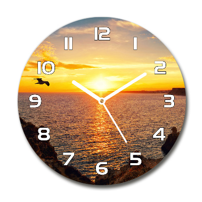 Wanduhr rund Sonnenuntergang am Meer