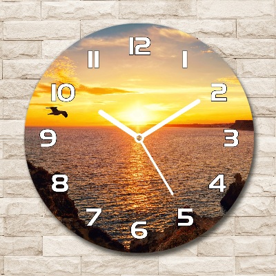 Wanduhr rund Sonnenuntergang am Meer