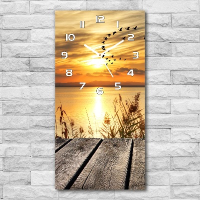 Vertikale Uhr Sonnenuntergang