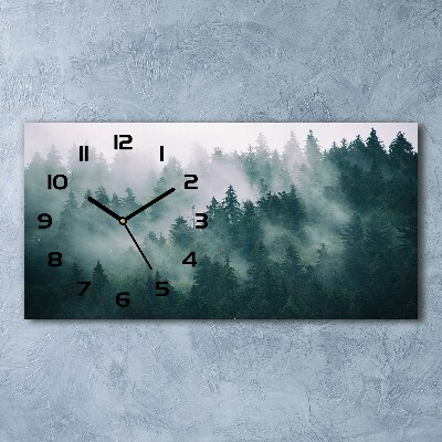 Moderne wanduhr Nebel über dem Wald