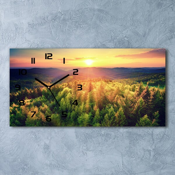 Moderne wanduhr Sonnenuntergang im Wald