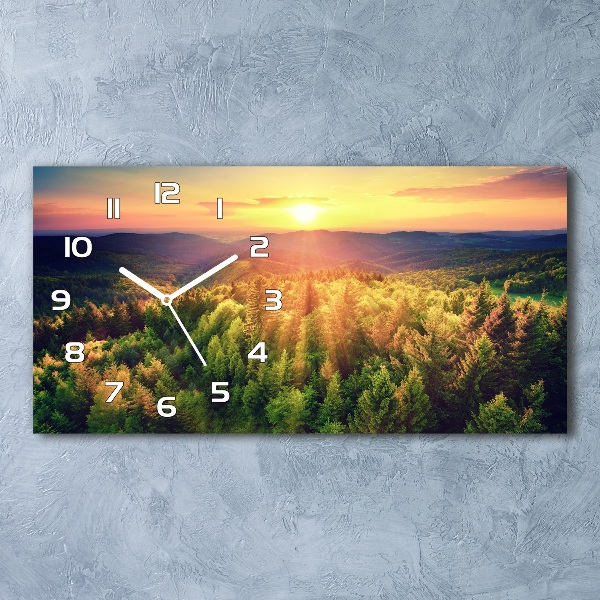 Moderne wanduhr Sonnenuntergang im Wald