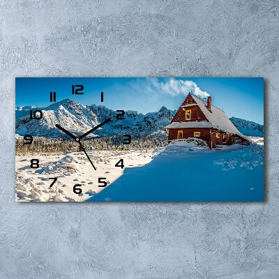 Moderne wanduhr Ein Ferienhaus in den Bergen