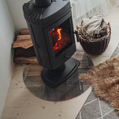 Runde Glasplatte für Kaminofen Lochstahlmotiv