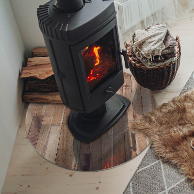 Runde Funkenschutzplatte aus Glas Holzmuster in geometrischer Anordnung