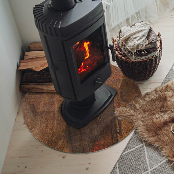 Runde Glasbodenplatte Kamin Rostabdruck auf Metalloberfläche