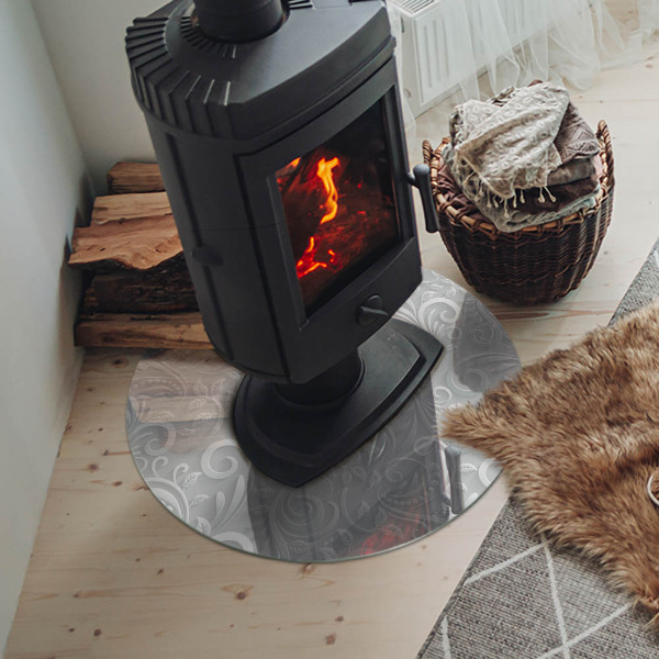 Runde Glasplatte für Kaminofen Stilvolles Pflanzenmotiv