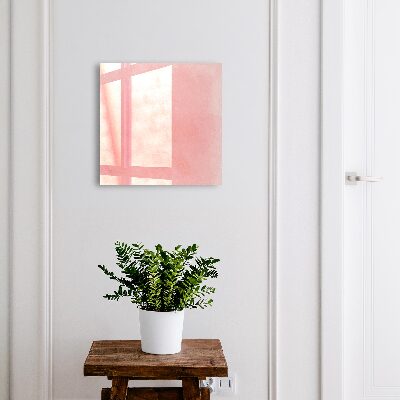 Schlüsselbox für die Wand mit rosa Hintergrund
