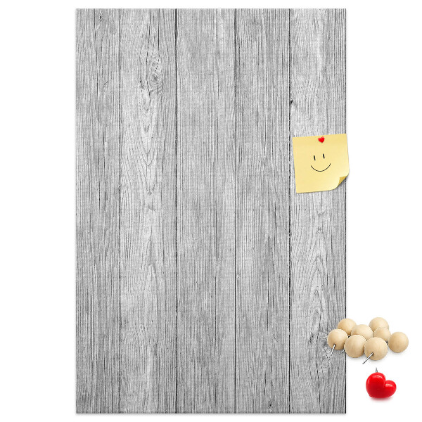 Bedruckte Korkplatte mit Textur von grauen Holzbrettern als Hintergrund