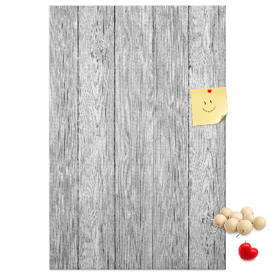 Bedruckte Korkplatte mit Textur von grauen Holzbrettern als Hintergrund
