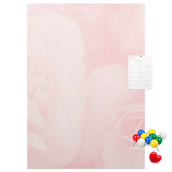 Pinnwand mit Motiv von zarten rosa Rosen im Hintergrund