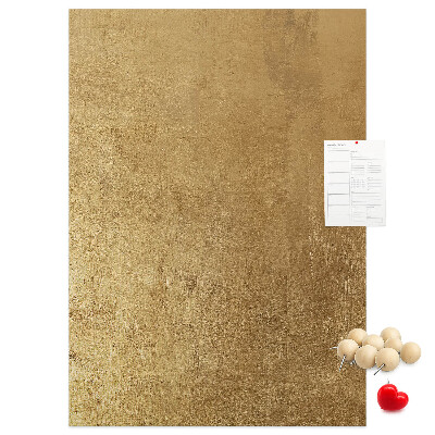 Kork-Pinnwand mit Goldpapier und farbigen Stecknadeln