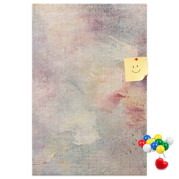 Pinnwand mit zarten Pastellflecken im Hintergrund