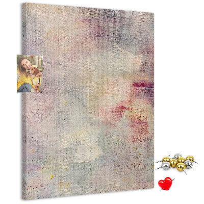 Pinnwand mit zarten Pastellflecken im Hintergrund