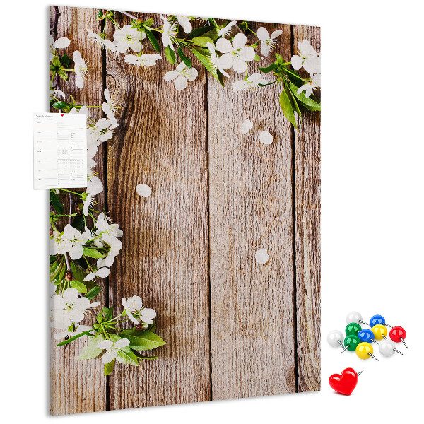 Pinnwand mit Motiv Blumen auf einem Hintergrund aus Holzbrettern