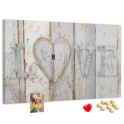 Korkbild mit dem Wort Liebe als Holzplakette