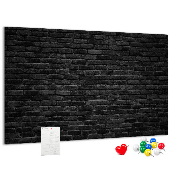 Bild mit Korkrückwand Nahaufnahme einer dunklen strukturierten Backsteinwand