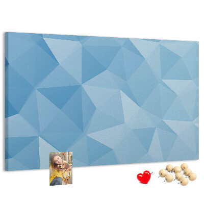 Korkbild mit geometrischen blauen Dreiecken in verschiedenen Schattierungen