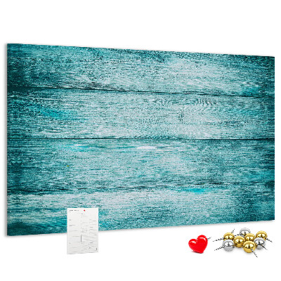 Korktafel mit grünem und blauem Holzbrett-Hintergrund