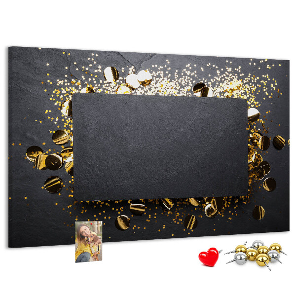 Korkbild goldenes Konfetti auf schwarzem Hintergrund
