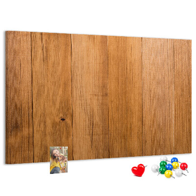 Korkbild mit farbigen Stecknadeln auf Holzbrett