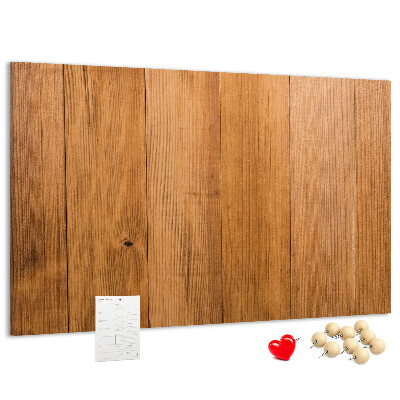 Korkbild mit farbigen Stecknadeln auf Holzbrett