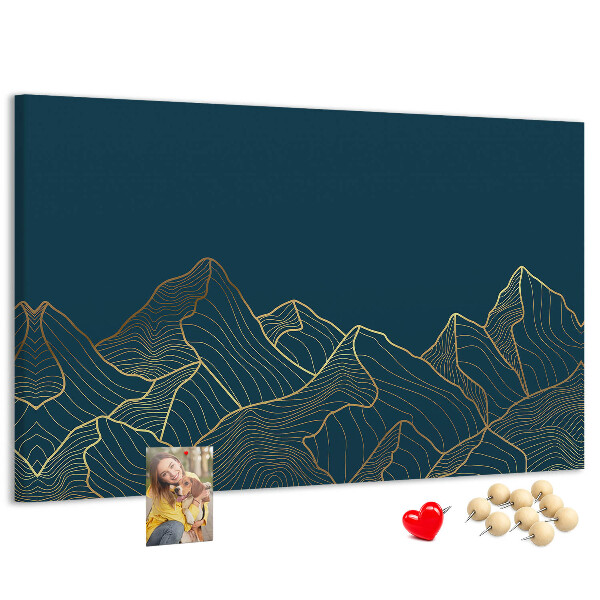 Kork-Pinnwand mit goldenen Bergumrissen auf dunklem Hintergrund