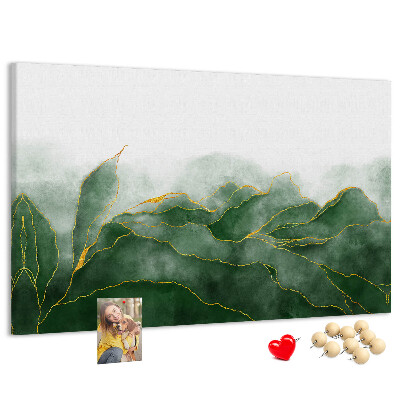 Bilder mit Korkrückwand goldene Akzente auf grünen Blättern