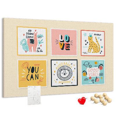 Korktafel mit farbenfrohen Grafiken und positiven Slogans