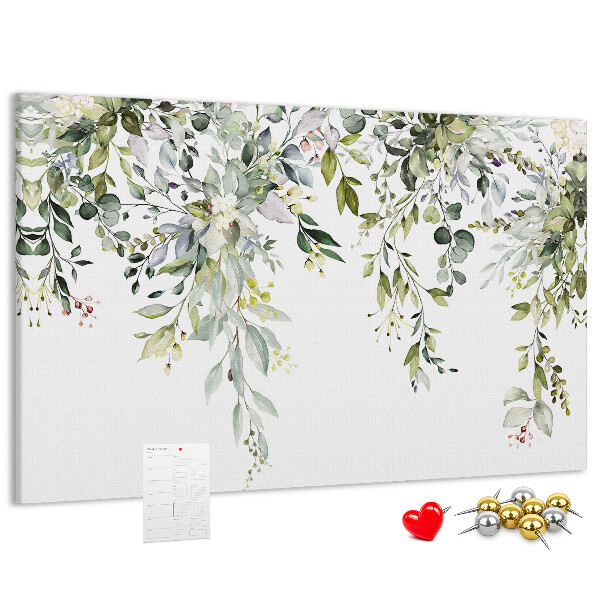 Korktafel mit Motiv aus grünen Blättern und zarten Blüten