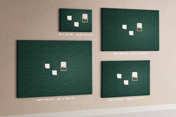 Korktafel mit Motiv grüne Blätter auf dunklem Hintergrund