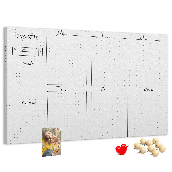 Planer mit Raster und Korkrückwand zur Organisation Ihrer Zeit