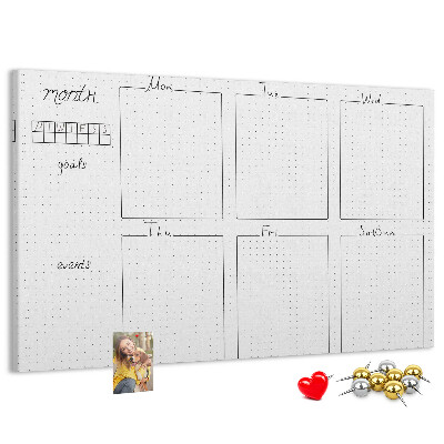 Planer mit Raster und Korkrückwand zur Organisation Ihrer Zeit