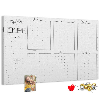 Planer mit Raster und Korkrückwand zur Organisation Ihrer Zeit