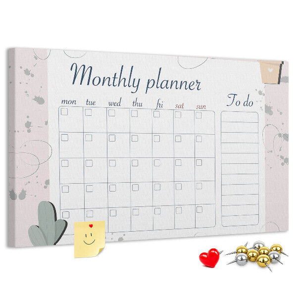 Korktafel mit Pflanzenmotiven als Monatsplaner