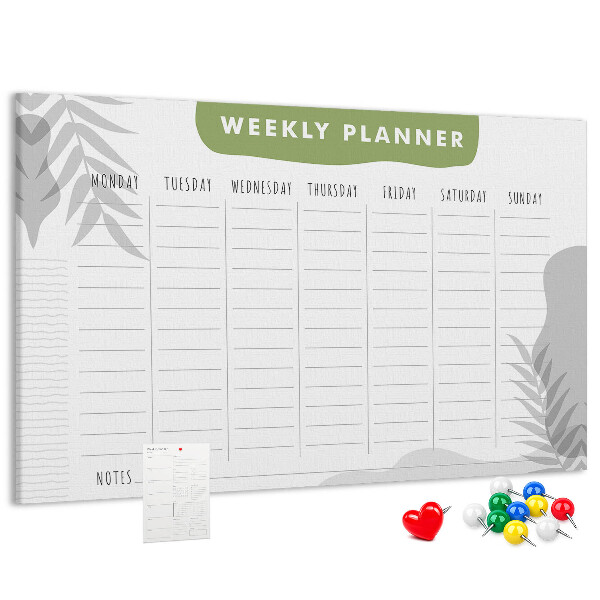 Korktafel mit Wochenplaner und Pflanzenmotiv