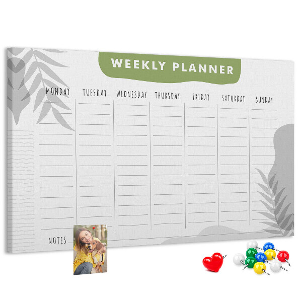 Korktafel mit Wochenplaner und Pflanzenmotiv
