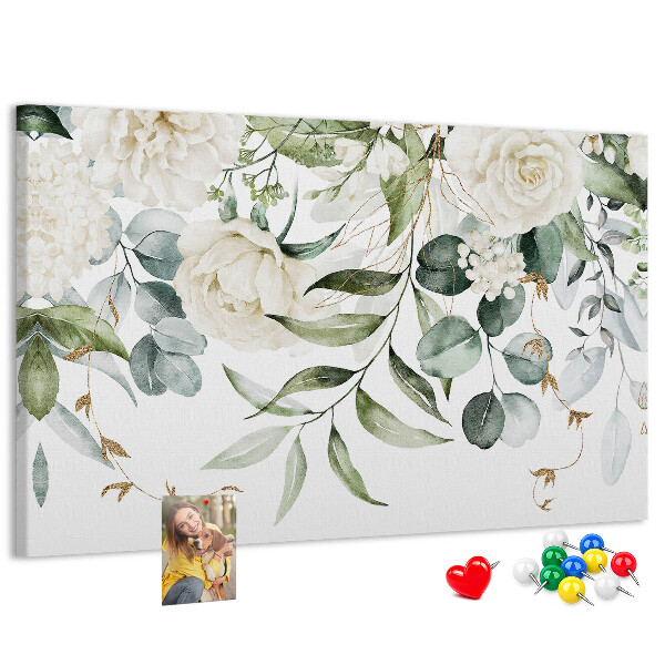 Bild mit Korkrückwand mit Blumenmuster und grünen Blättern