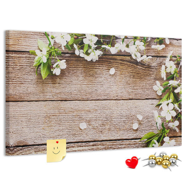 Korkbild mit Blumen auf einem Holzbrett-Hintergrund