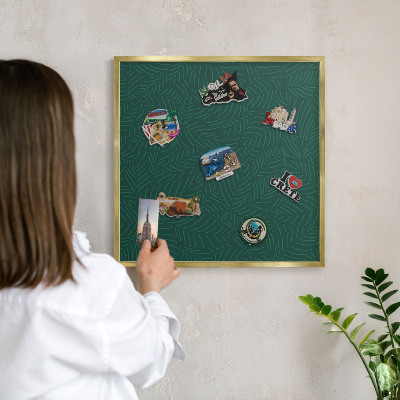 Magnettafel für Urlaubsmagnete in Goldrahmen Grüne Blätter