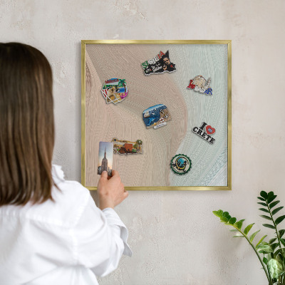 Magnettafel für Urlaubsmagnete in Goldrahmen Pastellwirbel