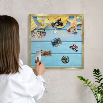 Magnettafel für Urlaubsmagnete in Goldrahmen Strandatmosphäre