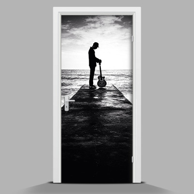 Selbstklebende Türtapete mit Motiv Mann mit einer Gitarre