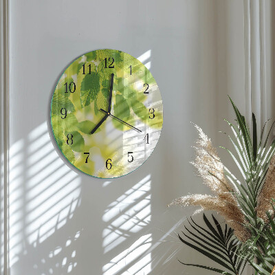 Wanduhr rund Blätter