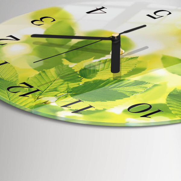 Wanduhr rund Blätter