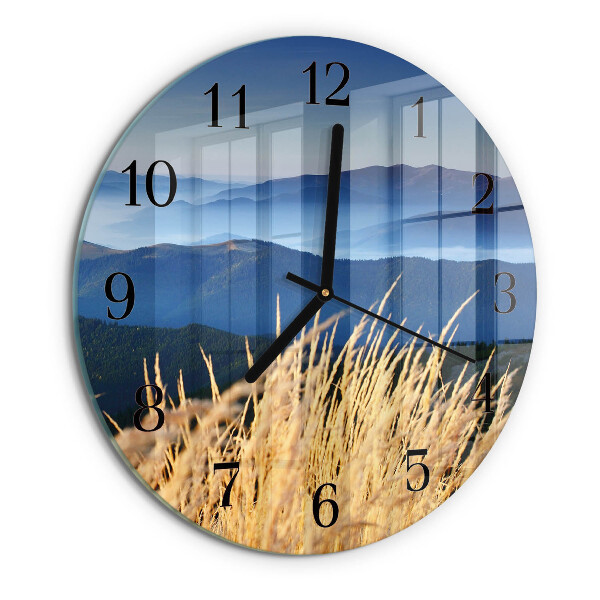 Wanduhr rund Berge Gras